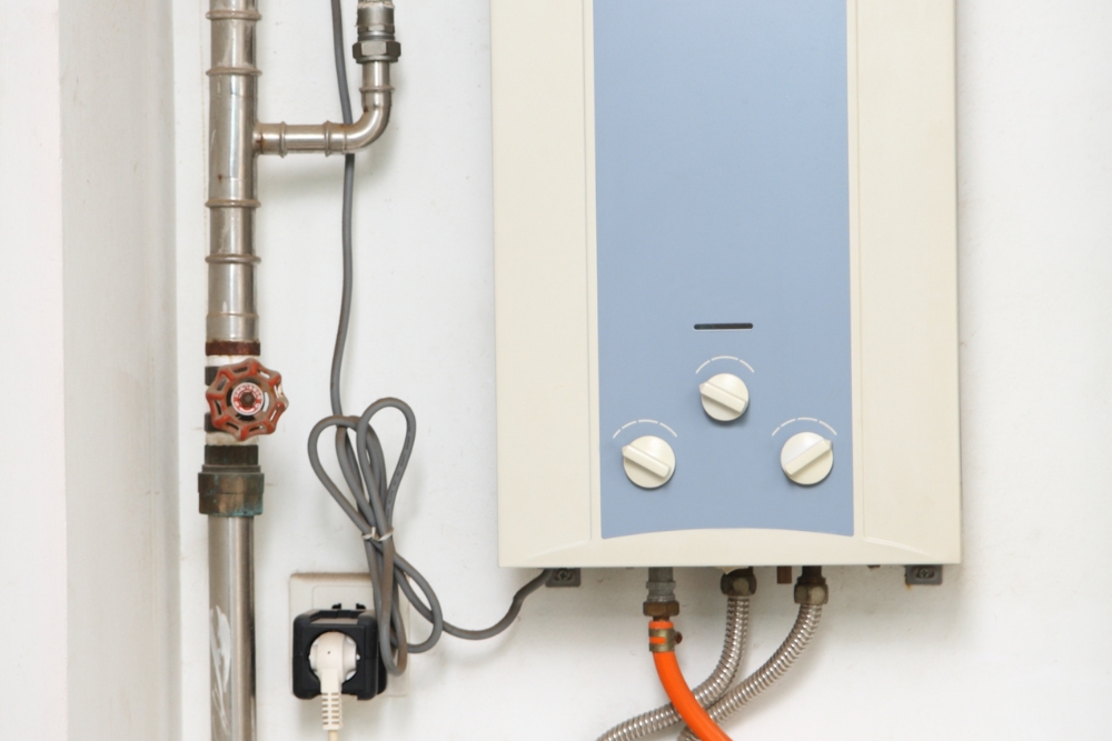 White and blue tankless hot water system
